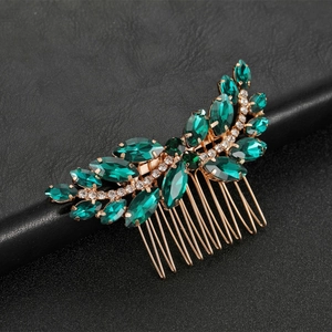 Elegant bridal hair comb with emerald green crystals and white rhinestones on gold base