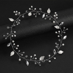 Elegant bridal hair vine with silver leaves, artificial pearls and sparkling crystals