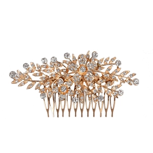 Elegant bridal hair comb with gold floral leaf design and sparkling rhinestones