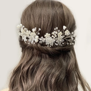 Elegant silver flower hair combs with pearls and crystals for bridal wedding hairstyles