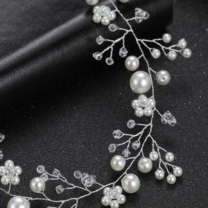 Handmade bridal hair vine with white pearls and crystals on silver wire for weddings