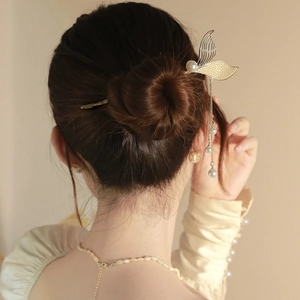 Elegant gold mermaid tail hair stick with tassels and pearls for Chinese style buns