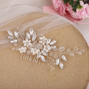 Elegant bridal hair comb with pearls and crystals on silver wire for weddings