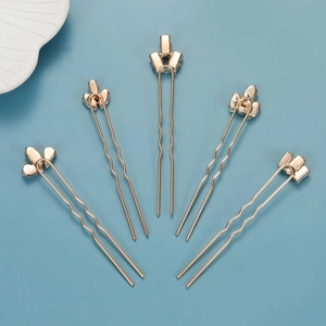 Five-piece set of gold wedding hair pins with crystal rhinestones and floral designs