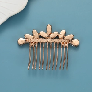 Eleganter Brauthaarkamm in Roségold mit fünf Blattmotiven und zwölf Metallzinken