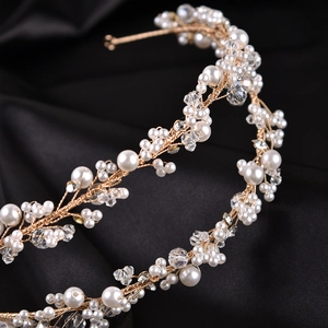 Elegant bridal double-row pearl headband with crystal beads and gold wire vine design