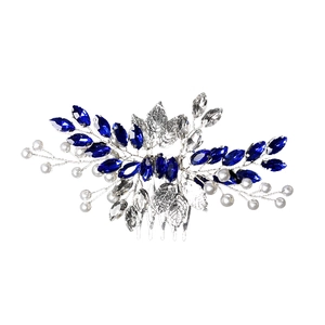 Peigne à cheveux de mariée avec feuilles argentées et cristaux marquise bleus