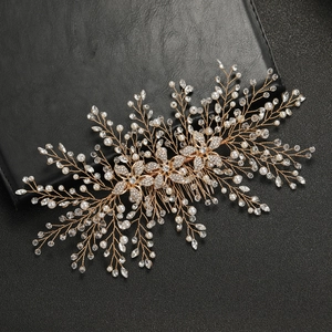 Luxury bridal hair comb with gold wire flowers, white pearls and sparkling rhinestones