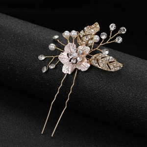 Elegant gold flower hair pin with pink enamel petals and sparkling rhinestones for bridal hair