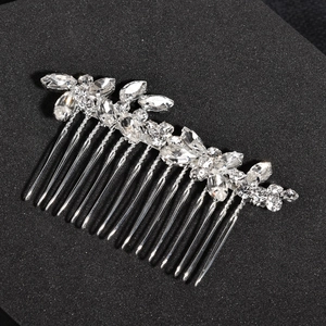 Elegant bridal hair comb with silver leaf patterns and marquise cut rhinestones
