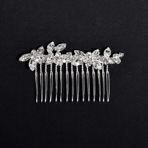Elegant bridal hair comb with silver leaf patterns and sparkling marquise crystals