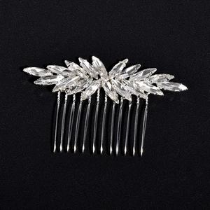 Exquisite bridal hair comb with marquise cut crystals and silver metal teeth on black background