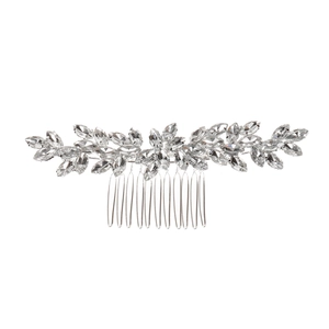 Detailed view of silver bridal hair comb with leaf motifs and sparkling rhinestones