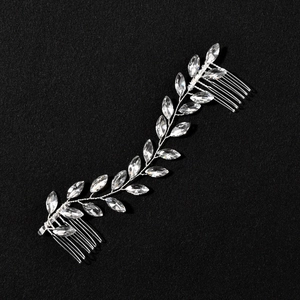 Silver bridal hair vine with marquise crystals and double combs on a black background