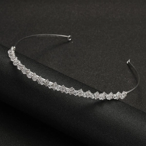 Macro shot of sparkling crystal rhinestones on a silver alloy bridal wedding headband