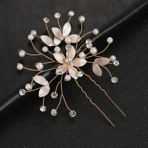 Elegant champagne gold flower bridal hair pin with pearls and sparkling rhinestones