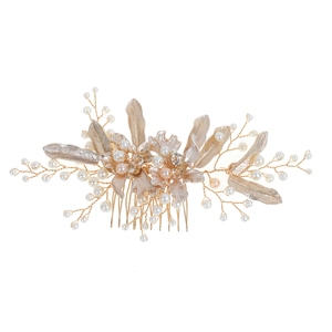 Elegant gold bridal hair comb with handmade pearls and leaf design for wedding hair styling