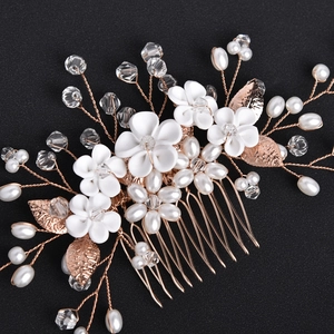 Handmade bridal hair comb with white clay flowers, pearls and rose gold metal leaves
