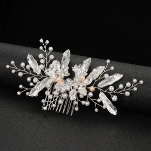 Silver bridal hair comb with pearls and leaf details for wedding hair accessories