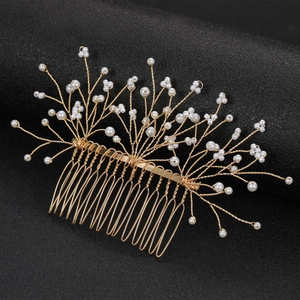 Handmade golden bridal hair comb featuring elegant white faux pearls and branch design