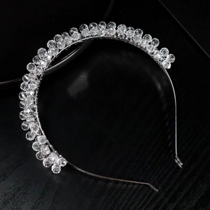 Elegant bridal silver headband featuring clear crystal beads for wedding and parties