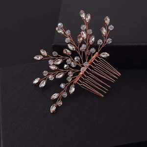 Elegant bridal hair comb with pearls and crystals in rose gold wire for wedding hair