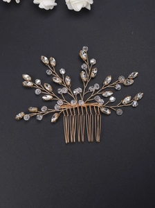 Elegant gold bridal hair comb with pearls and crystals for wedding hairstyles