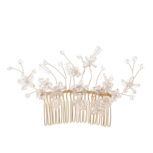 Detailed view of handcrafted bridal hair comb with gold wires and crystal floral accents