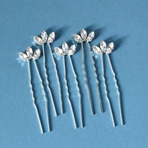 Detailed close-up of 5-piece silver U-shaped hair pins with marquise-cut rhinestones