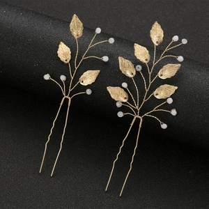 Set of two gold leaf hair pins with white bead accents for elegant wedding hairstyles