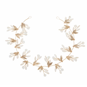 Golden bridal hair vine with leaf patterns and translucent crystal beads on white background