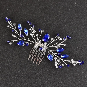 Detailed view of handmade bridal hair comb with dark blue crystals and silver wire