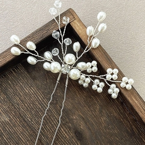 Handmade bridal hair pin with white pearls and crystals on silver wire for wedding hair styling