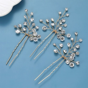 Lot de trois épingles à cheveux de mariée dorées en U avec strass et branches en fil