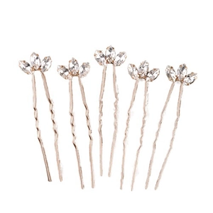 Detail of rose gold U-shaped hairpins featuring three marquise-cut crystals in a leaf design