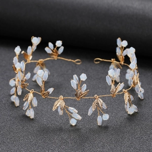 Elegant gold leaf bridal headband with white opal beads for wedding hair styling decor