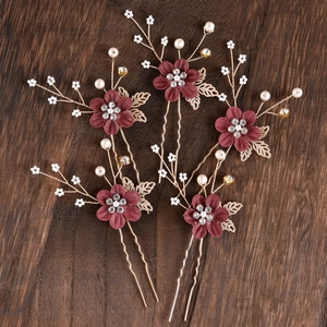 Detailed close-up of 5pcs burgundy flower hair pins with pearls and crystals