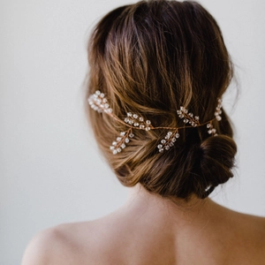 Champagne gold crystal bridal hair vine with shimmering rhinestones for wedding hairstyle