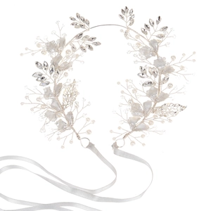 Detail of silver bridal hairpiece featuring leaf wire, marquise rhinestones and pearls