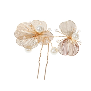 Elegant hollow gold flower hair pin with pearls and crystals for bridal styling