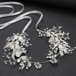 Silver bridal hair vine with white pearls, crystals and metallic leaf details with ribbon