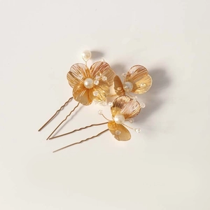 Set of two gold hollow flower hair pins with pearls and crystals for bridal styling
