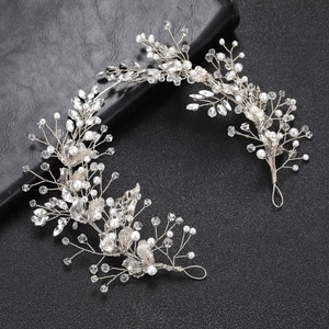 Elegant silver leaf hair vine with pearls and crystals for bridal wedding hairstyles