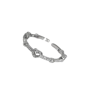 Minimalist silver open heart ring featuring sparkling white cubic zirconia pave setting
