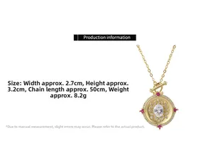 Detailed close-up of vintage gold mirror pendant with red rubies and Italian wire drawing