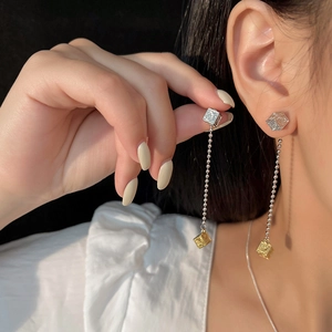 Silver needle long tassel earrings with gold and silver cube drop and elegant metal chain