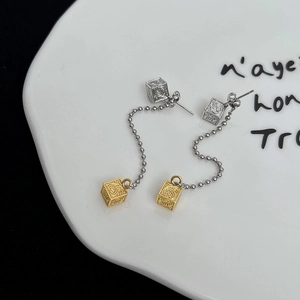 Silver needle long drop earrings with gold square pendants and vintage arabesque patterns