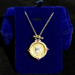Vintage gold round pendant necklace with oval center stone and T-bar toggle clasp