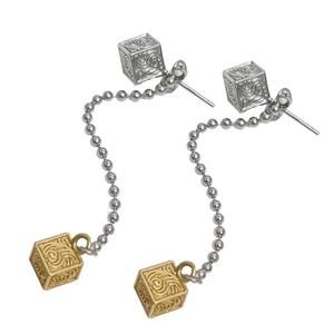 Silver needle long tassel drop earrings with gold and silver engraved cubes in vintage style