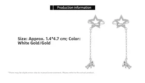 Detail view of star and bear tassel earrings in silver finish measuring 1.4 by 4.7 cm